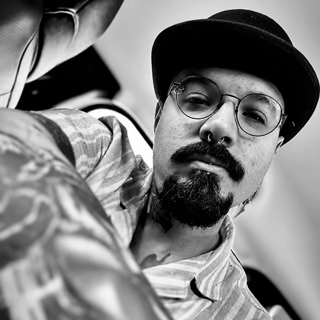 Lucas Zatti tattooing in his studio in Temple Bar, Dublin