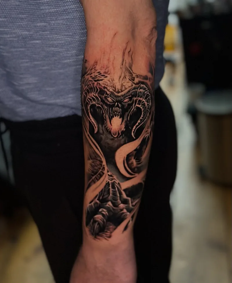 the Balrog from Lord of the Rings on the forearm, black and grey realism tattoo by Lucas Zatti, Temple Bar Dublin