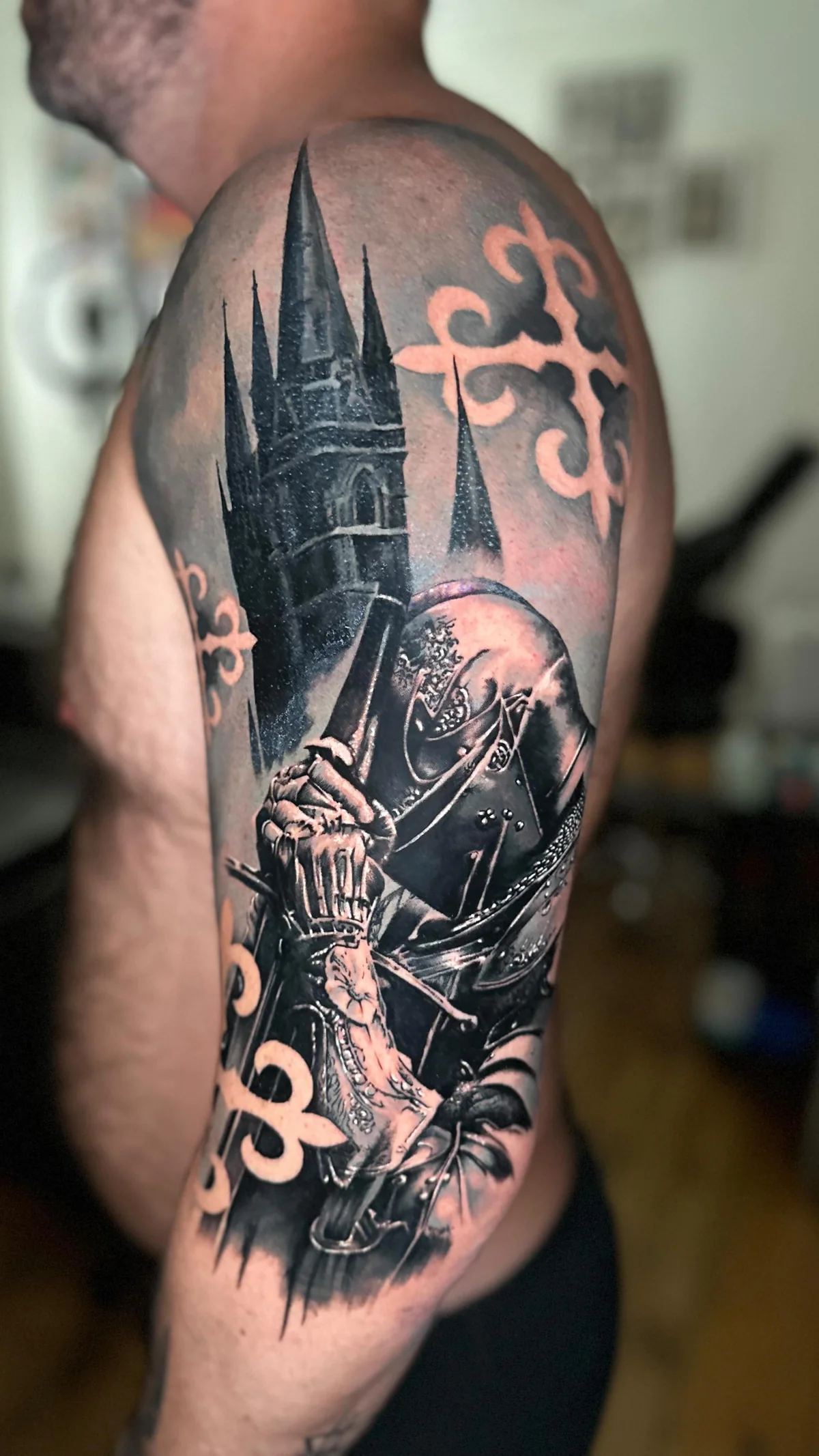 a faded dragon tattoo covered with a dark knight and a cathedral, black and grey realism tattoo by Lucas Zatti, Temple Bar Dublin
